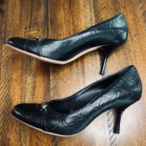 Authentic Gucci Black Leather Monogrammed Rounded Toe Heels